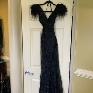 Poritier and Scarlet black beaded gown size 2 has a small train